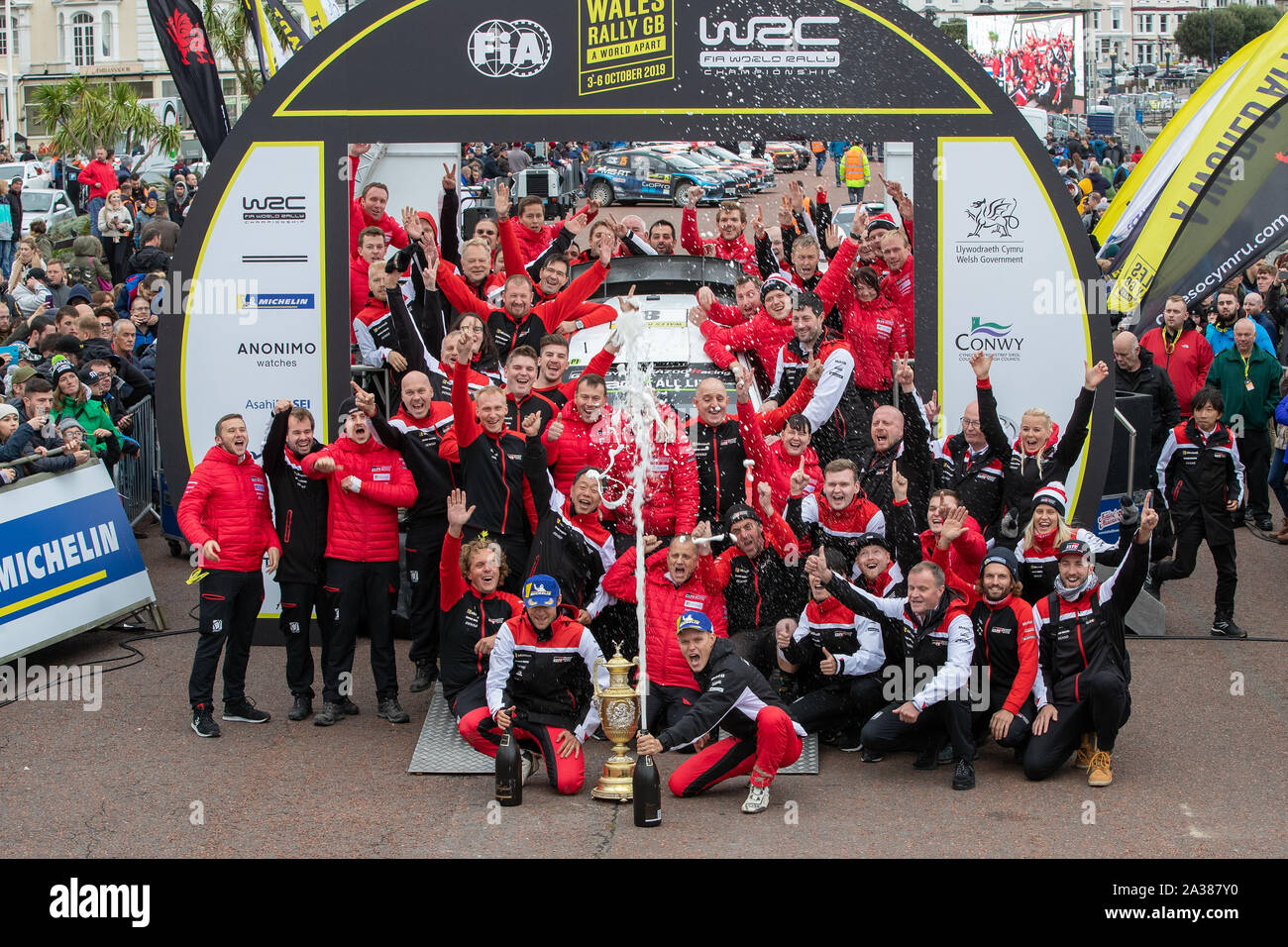 LLandudno, UK. 6 Oct 2019, Ott Tanak and co-driver Martin Jarveoja celebrating with his team wining Rally GB  Credit: Jason Richardson/Alamy Live News Stock Photo