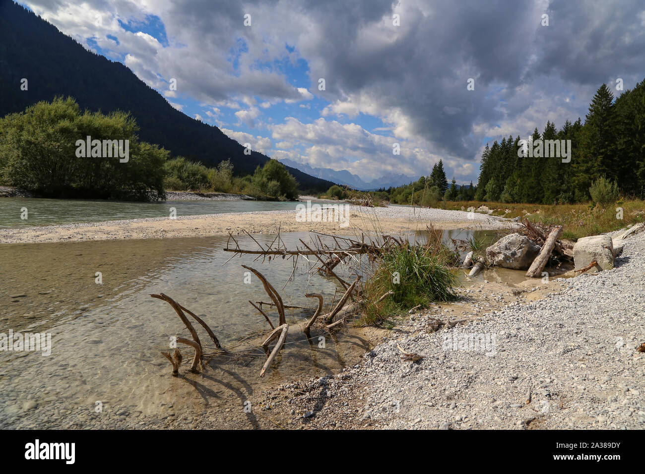 Mountain landscape with a small river in the Alps Stock Photo - Alamy