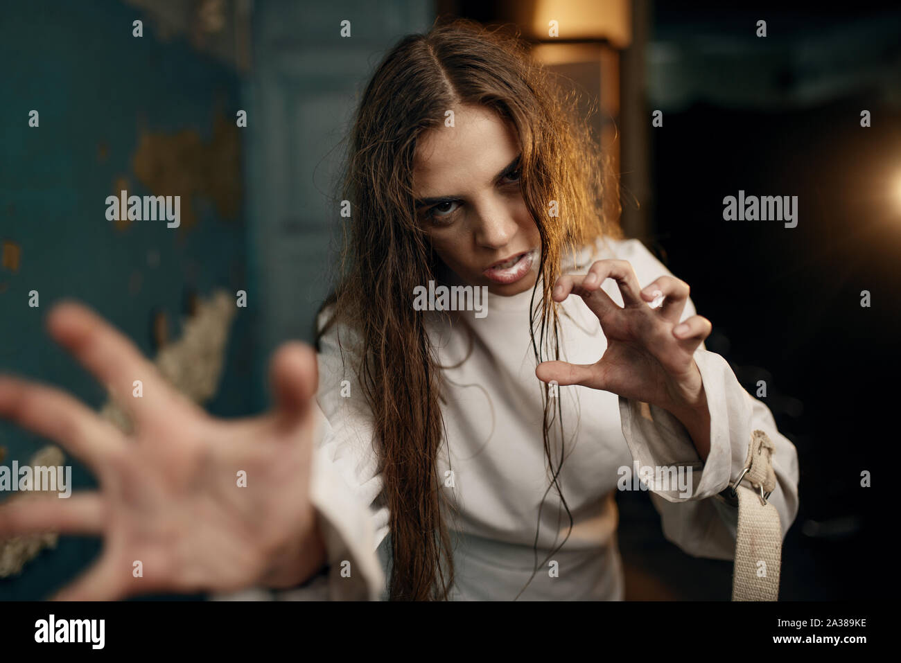 Female patient in a fit of rage, schizophrenia Stock Photo