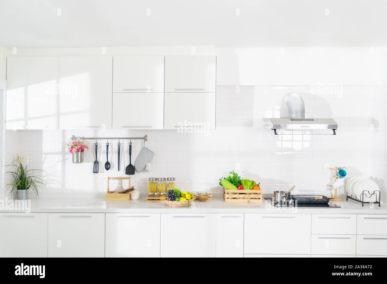 Modern white kitchen with counter and white details, minimalist ...