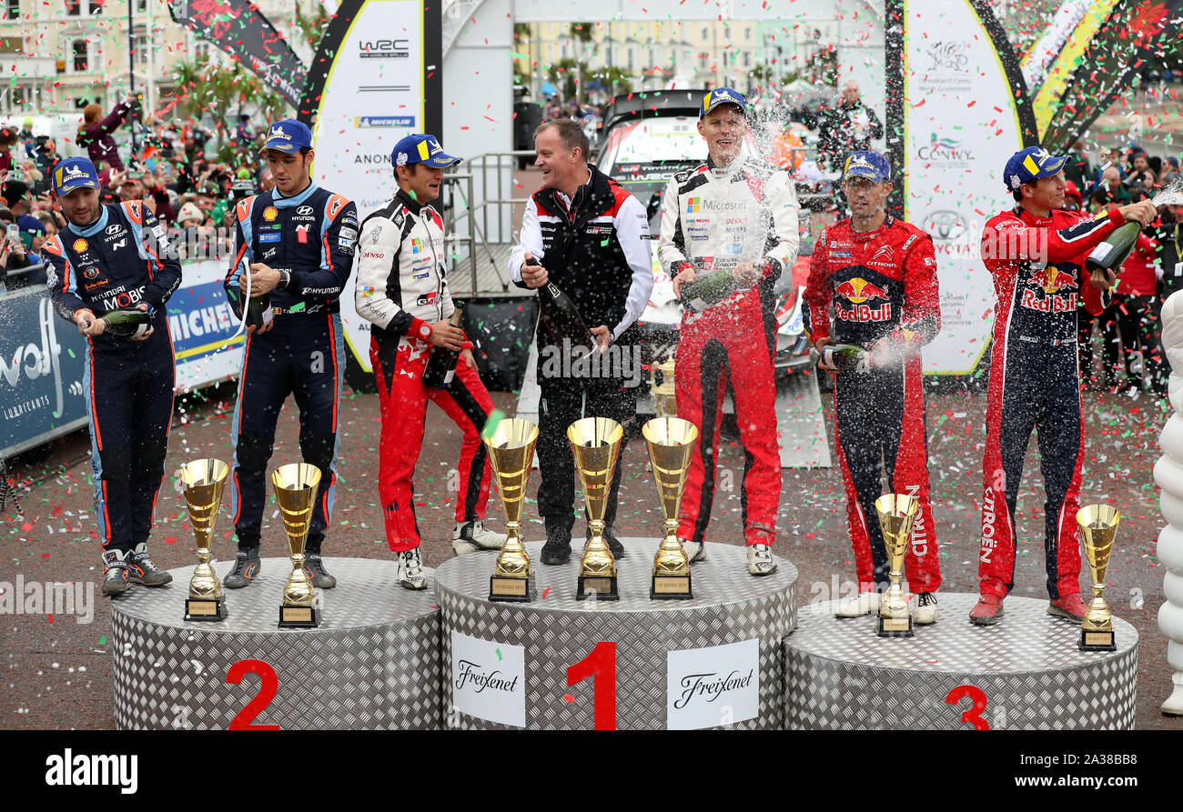 Winners of the Wales Rally GB Estonia’s Ott Tanak and Martin Jarveoja celebrate on the podium during day four of the Wales Rally GB. Stock Photo