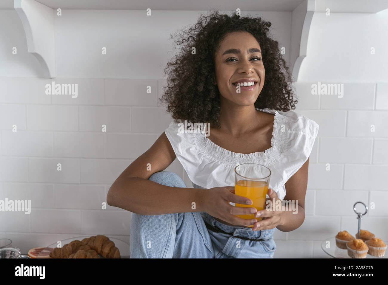 Young woman being happy early in the morning Stock Photo