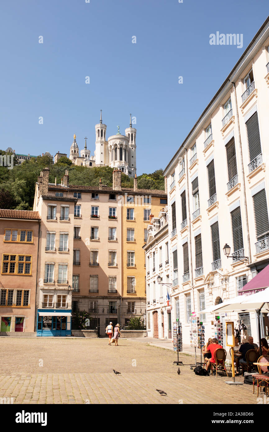 Looking up toward the Basilica Notre-Dame de Fourviere from Place Saint-Jean in Lyon, France. Stock Photo