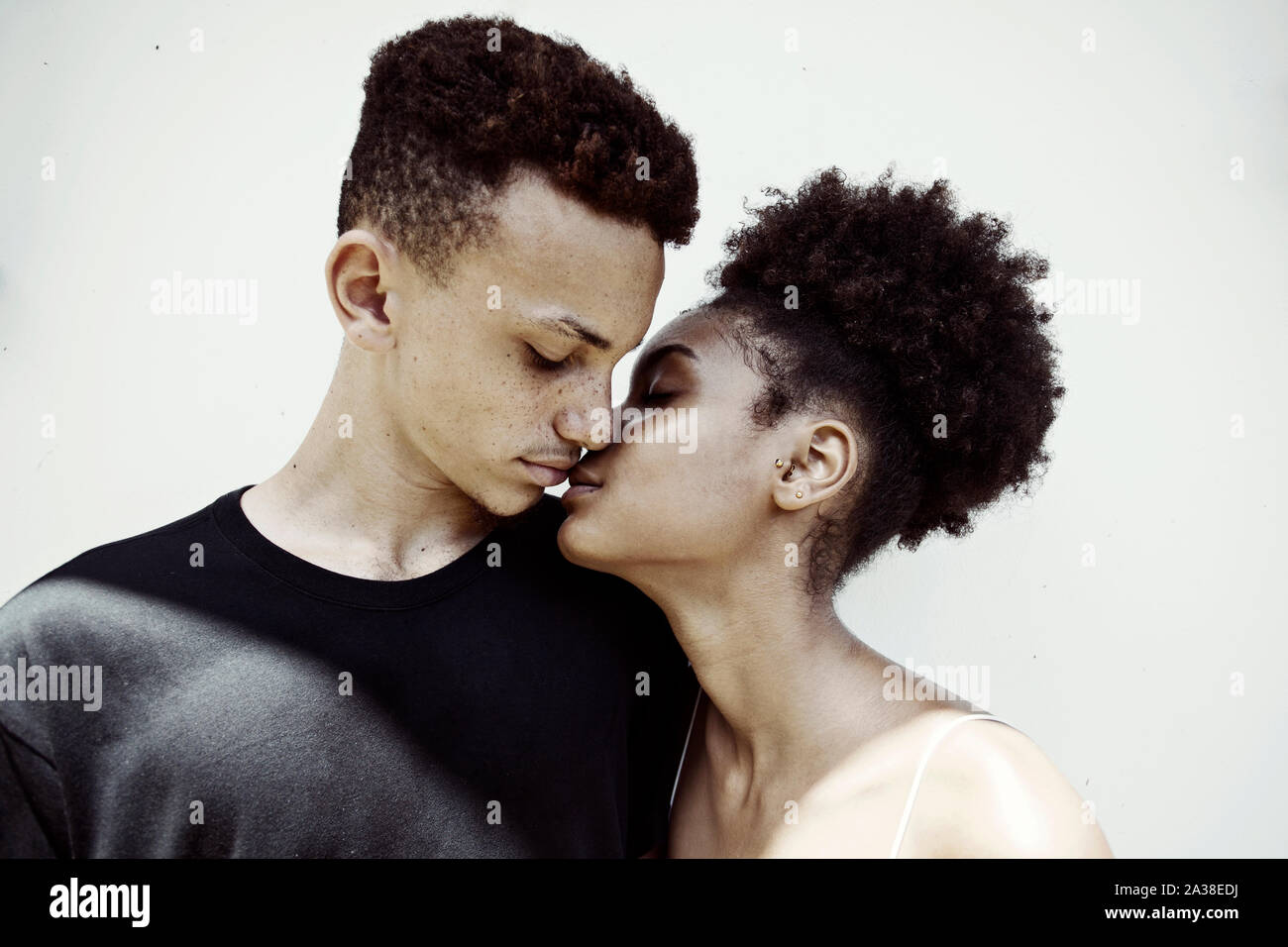 Close-up portrait of a couple about to kiss Stock Photo