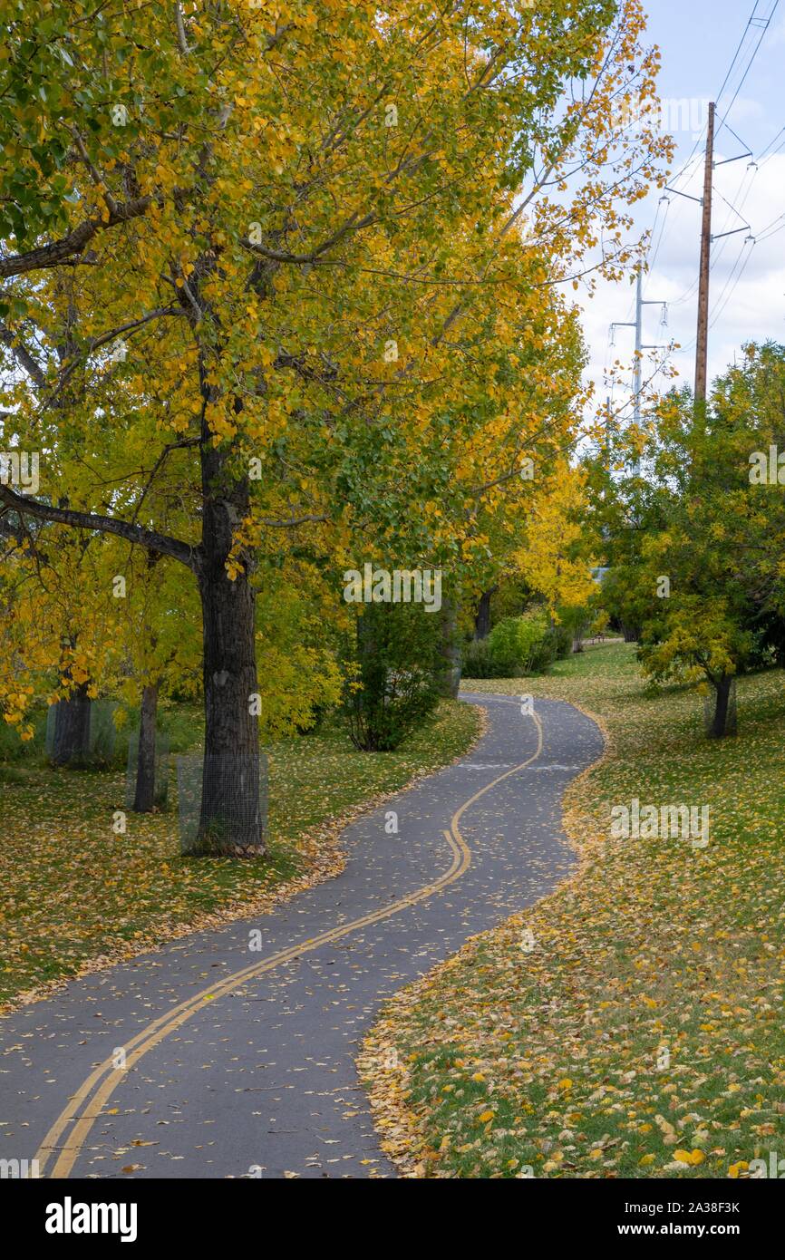 walking biking path along the Bow River Calgary Alberta in the fall ...
