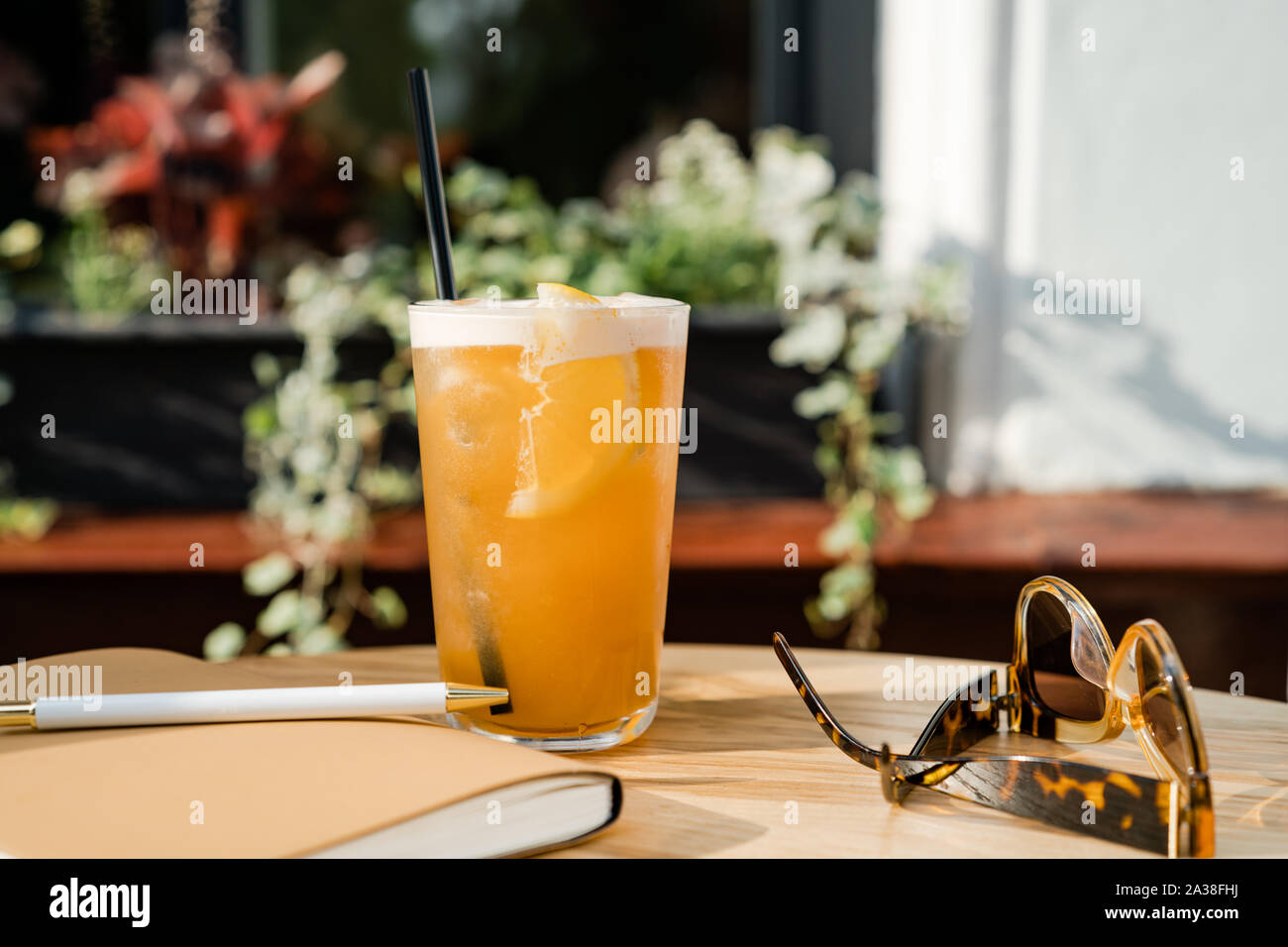 Bourbon cocktail in a frosted glass with a orange slice Stock Photo