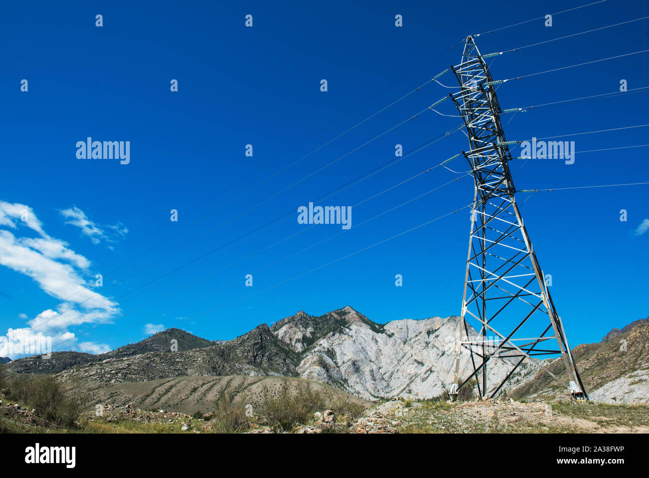 Power lines in the beautiful mountain landscape Stock Photo - Alamy