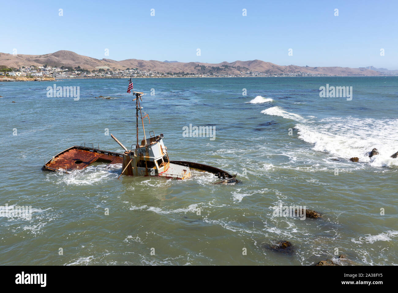 An abandoned fishing boat which ran aground at Point Estero, Cayucos