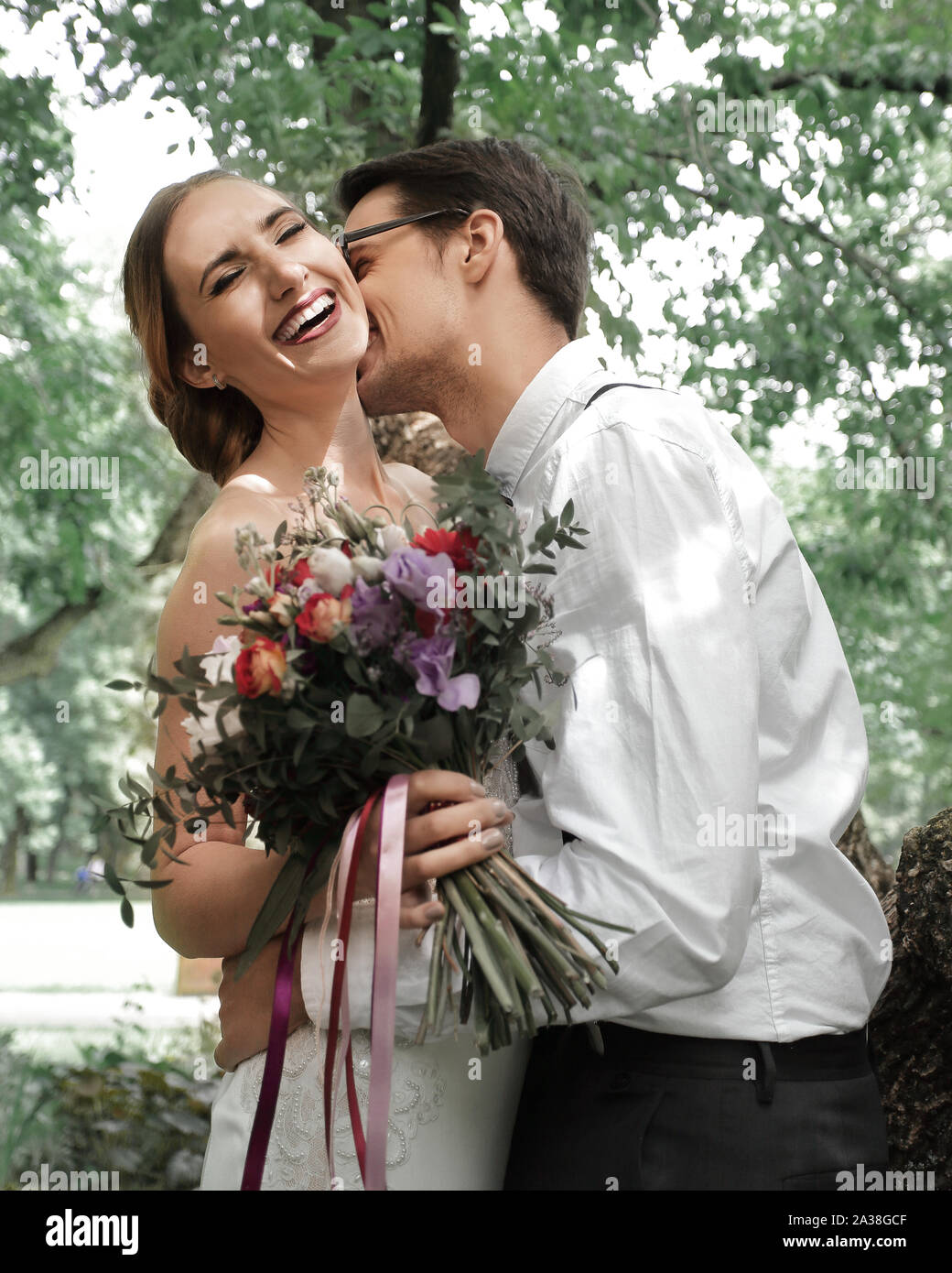 Cute newlyweds kissing on wedding hi-res stock photography and images ...
