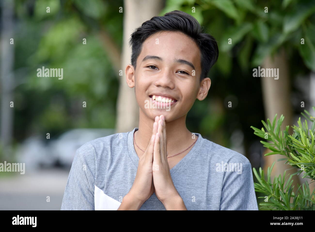 A Handsome Filipino Male In Prayer Stock Photo - Alamy