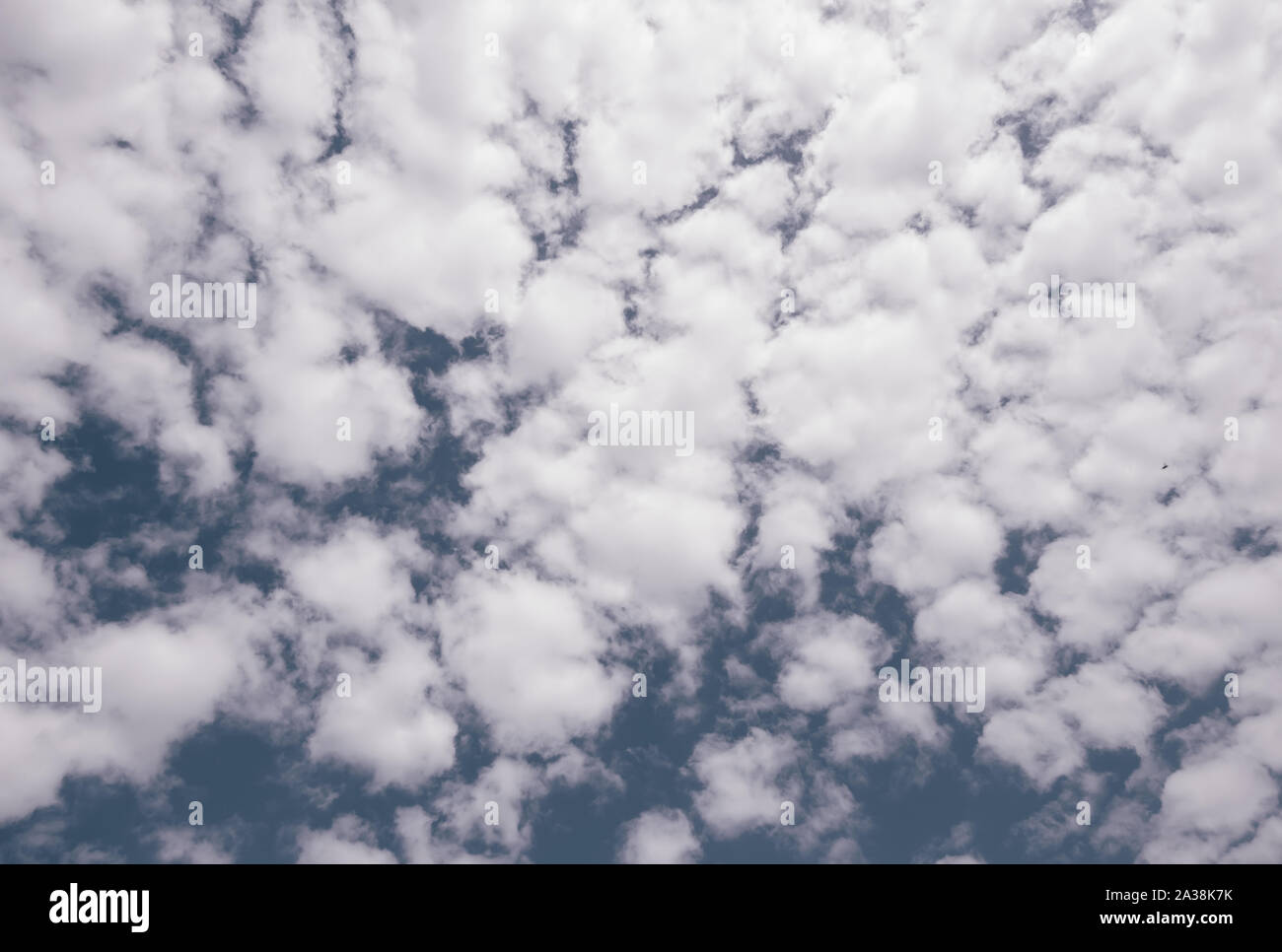 Blue sky and white fluffy clouds. Background image Stock Photo - Alamy