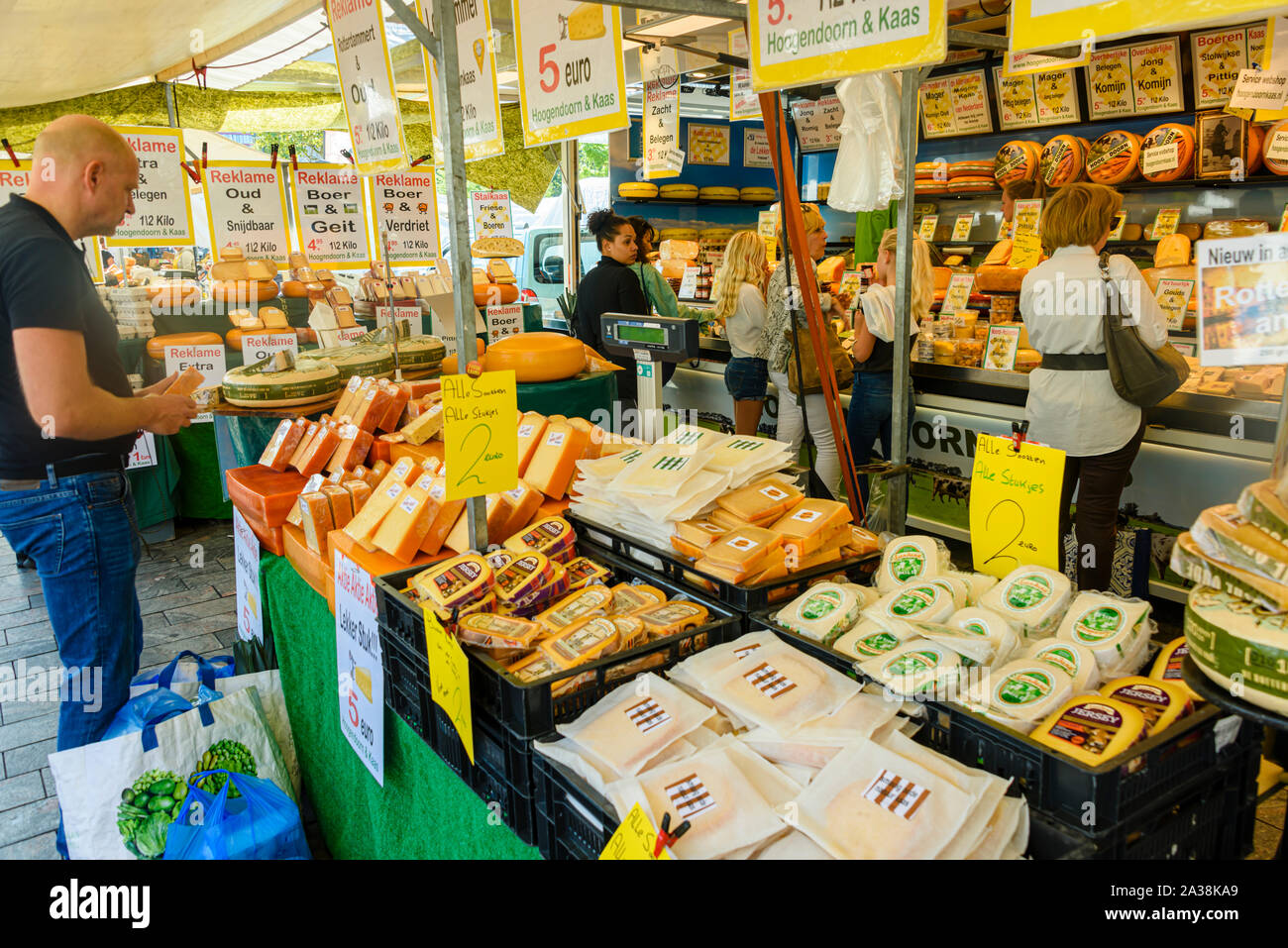 Customers in a Dutch cheese shop, Rotterdam, Netherlands Stock Photo