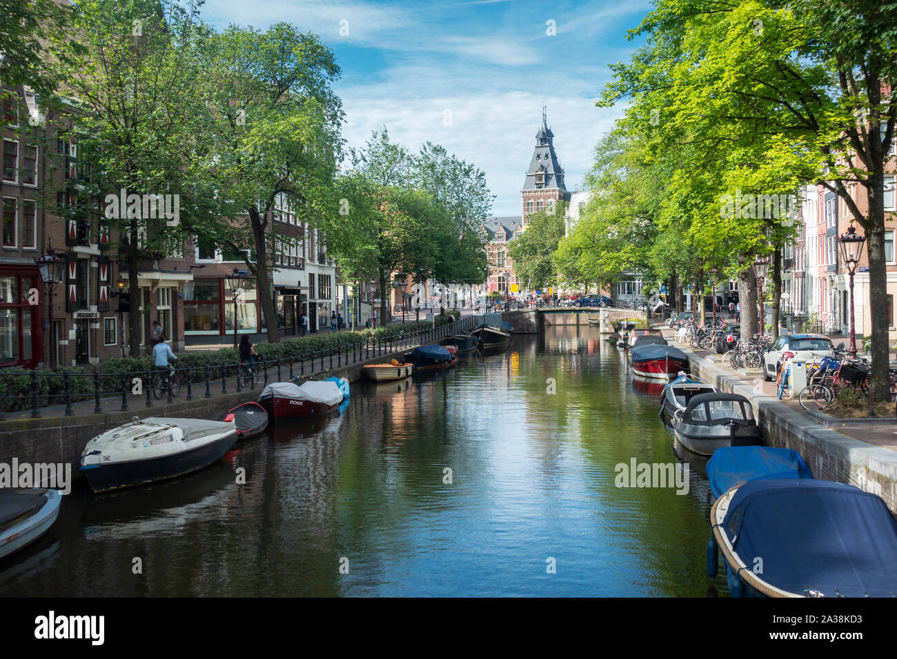 Boats line the canals of Amsterdam, Netherlands, Europe Stock Photo