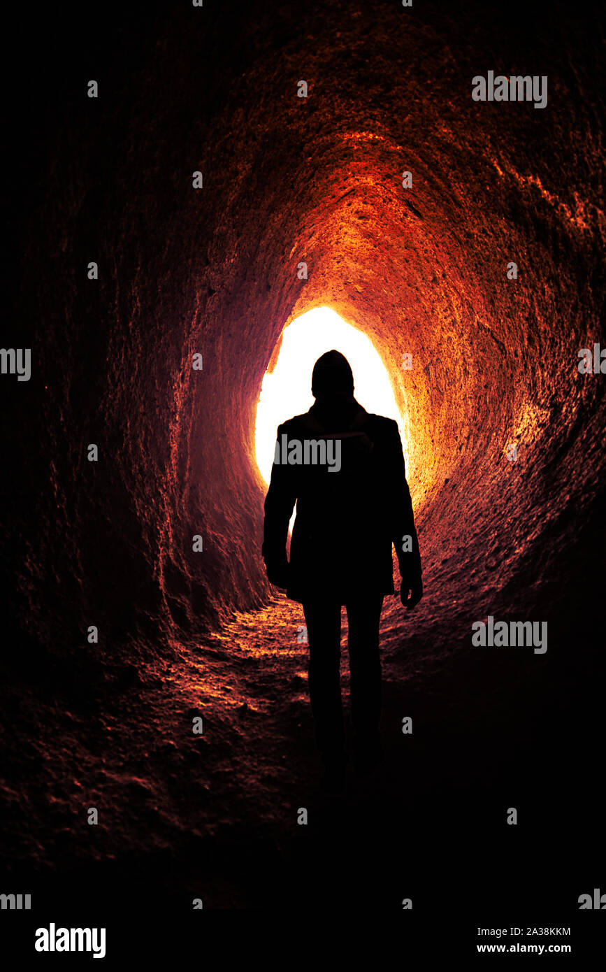 young man in a cave Stock Photo Alamy