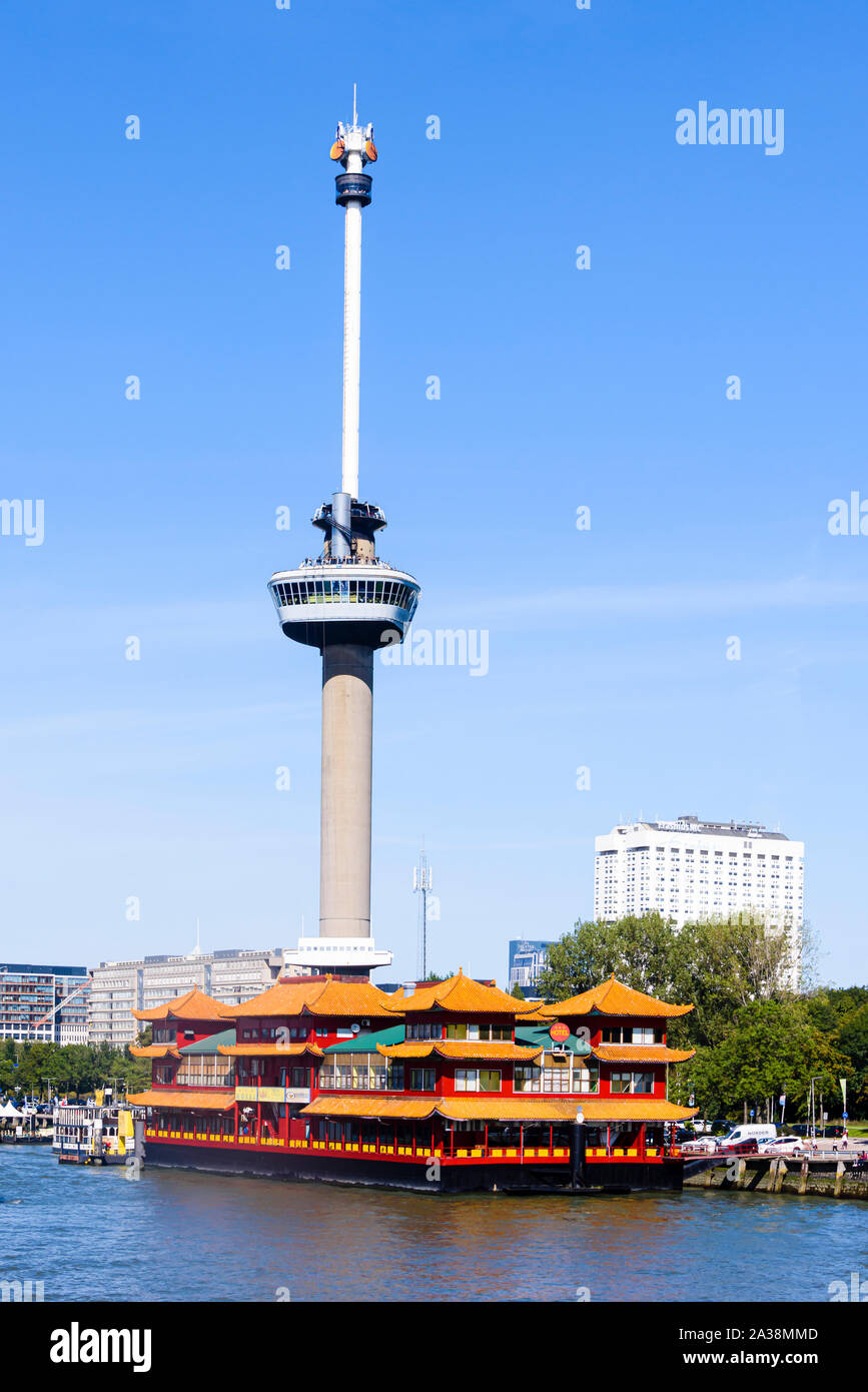 New Ocean Paradise floating Chinese hotel and restaurant with the Euromast Observation Tower behind, Rotterdam, Netherlands. Stock Photo