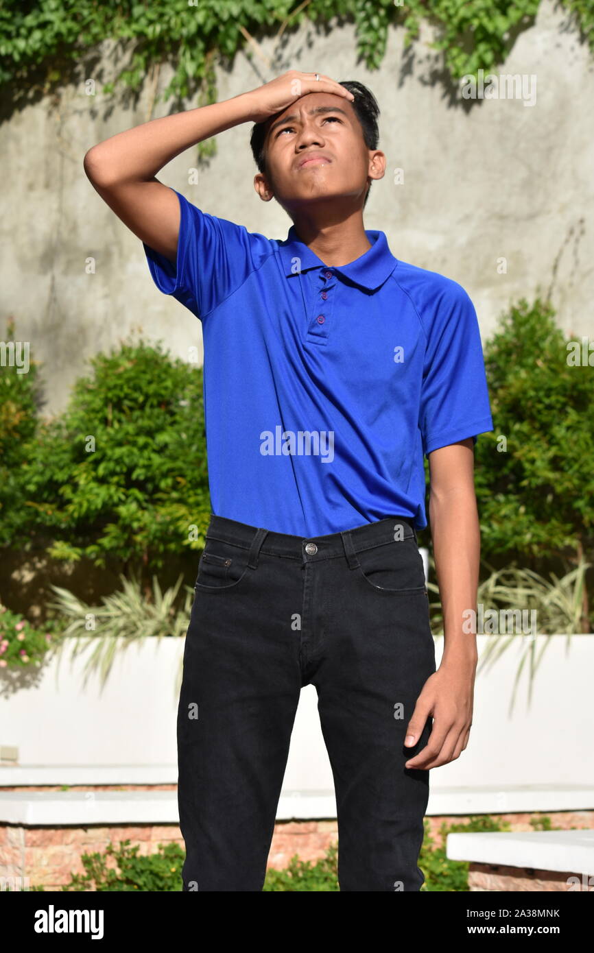 An A Forgetful Asian Boy Stock Photo - Alamy