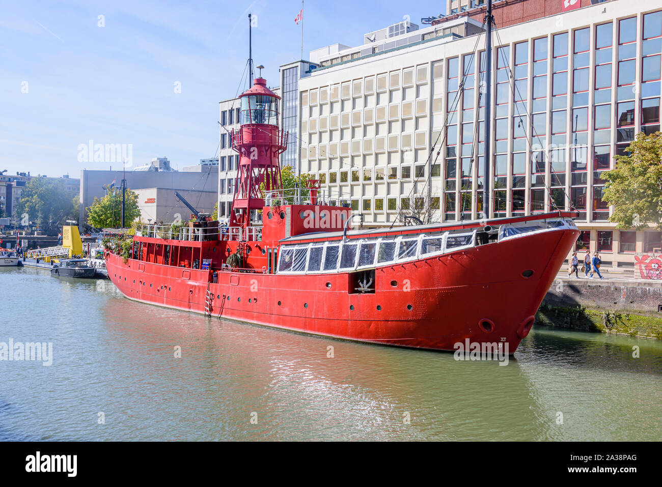 Vessel 11, formerly a lightship, now a restaurant, music venue, and even has floating wood-fired heated spas.  Rotterdam, Netherlands. Stock Photo