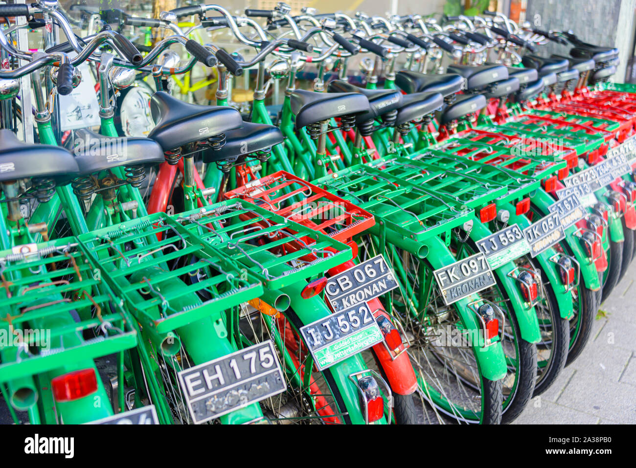 Dutch bicycles with identity plates lined up for hire.  Rotterdam, Netherlands. Stock Photo