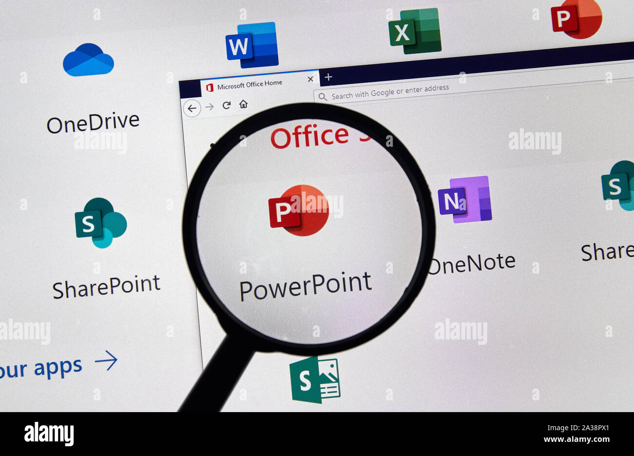 MONTREAL, CANADA - APRIL 24, 2019: Microsoft Powerpoint new logo under magnifying glass over a loptop screen. Microsoft Office is a family of client-s Stock Photo