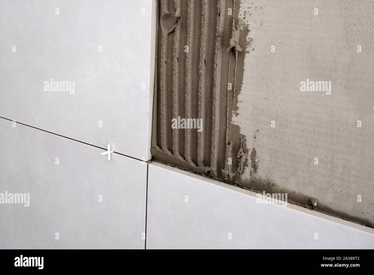 Wall ceramic tiles installation on mortar glue Stock Photo Alamy