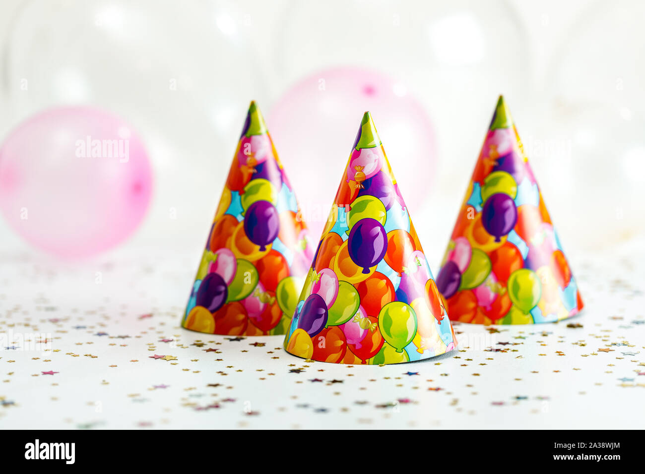 confetti and party hat. party background with copy space Stock Photo