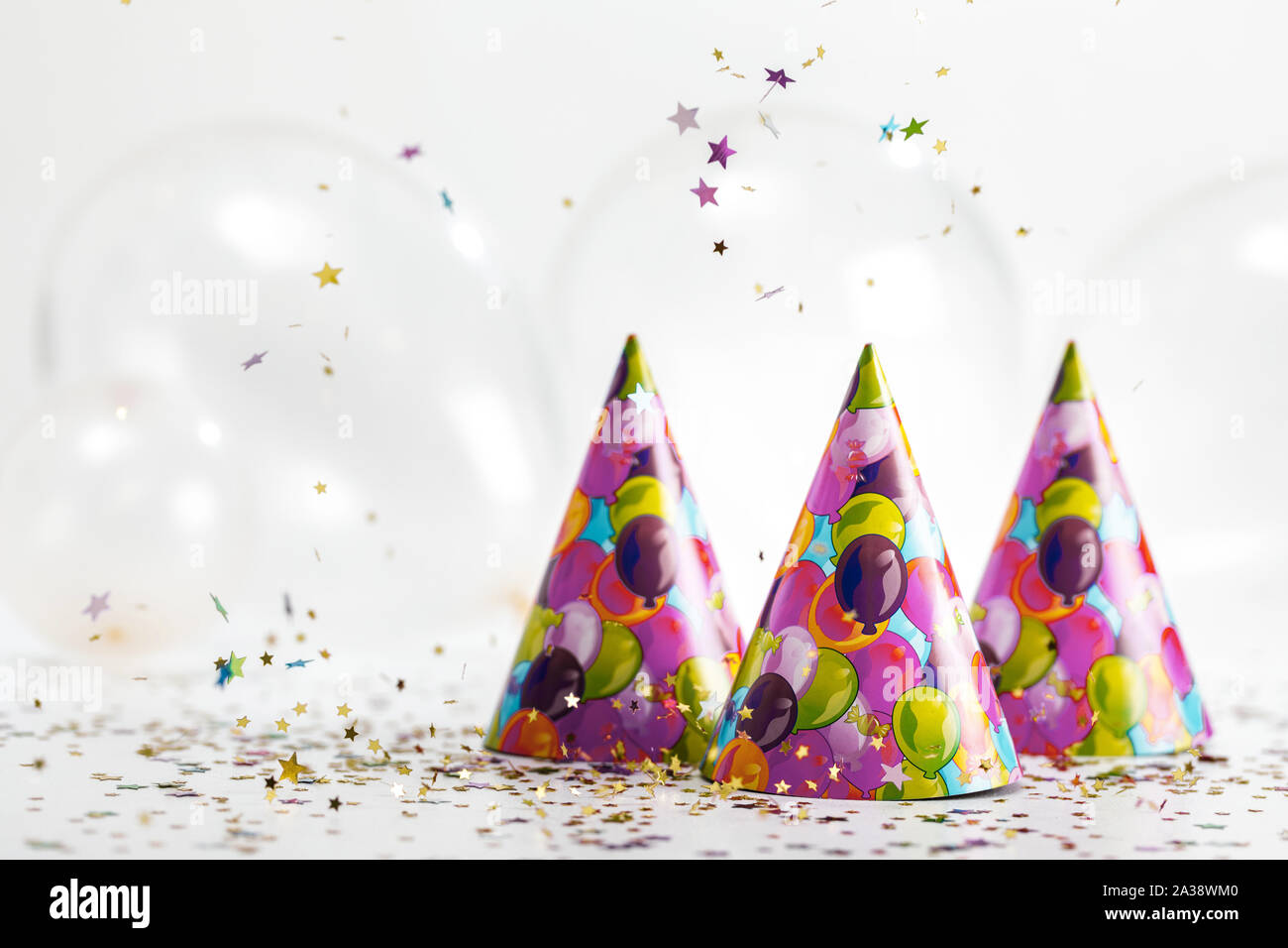 confetti and party hat. party background with copy space Stock Photo
