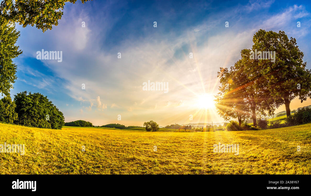 Beautiful sunrise in the countryside at summer time Stock Photo