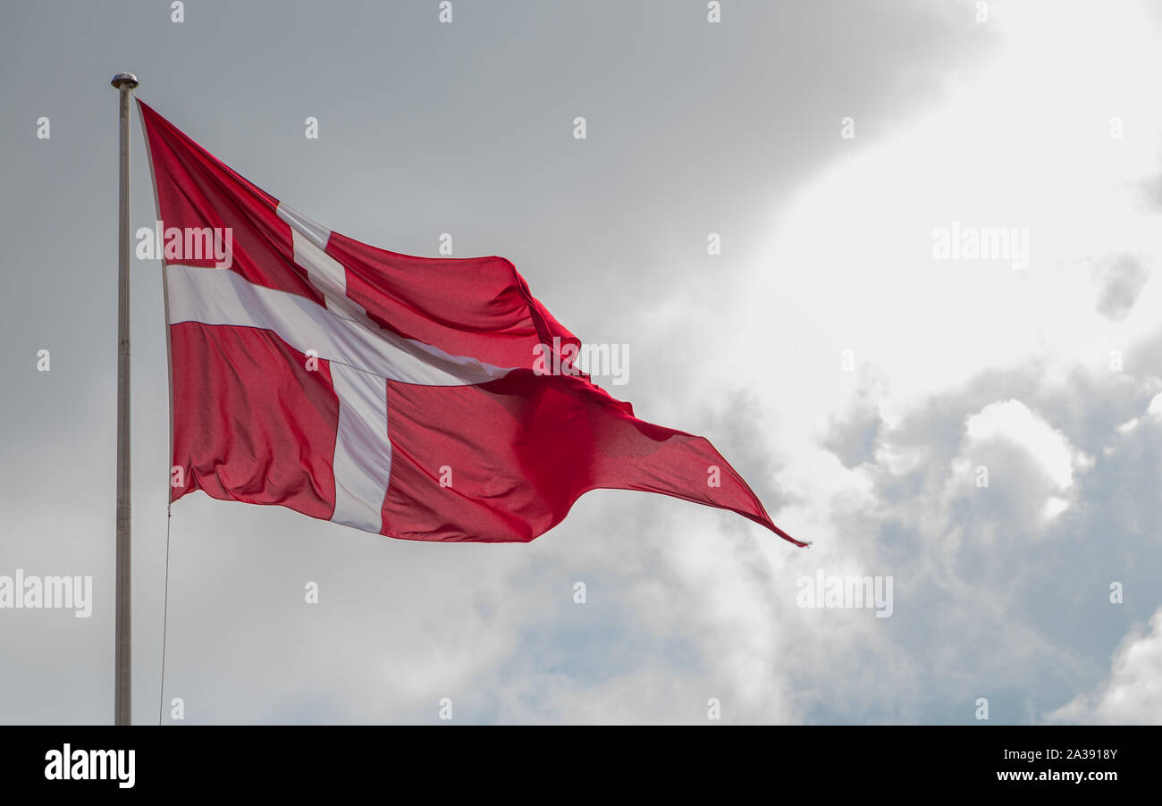 A picture of the Danish flag waving in the wind (Copenhagen). Stock Photo