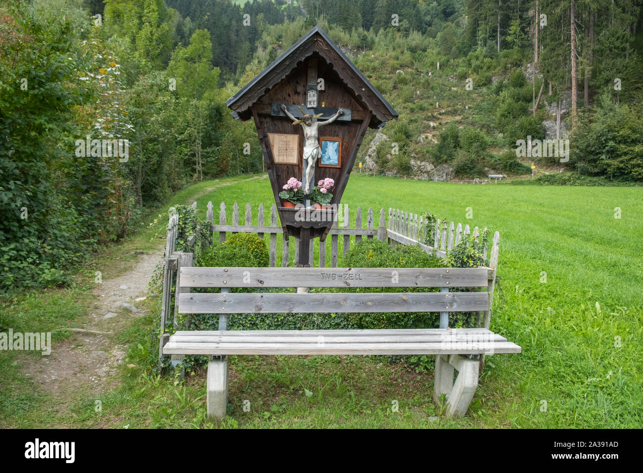 Wayside Cross between Zellberg and Hippach in Austria, Zillertal, Tyrol. Stock Photo