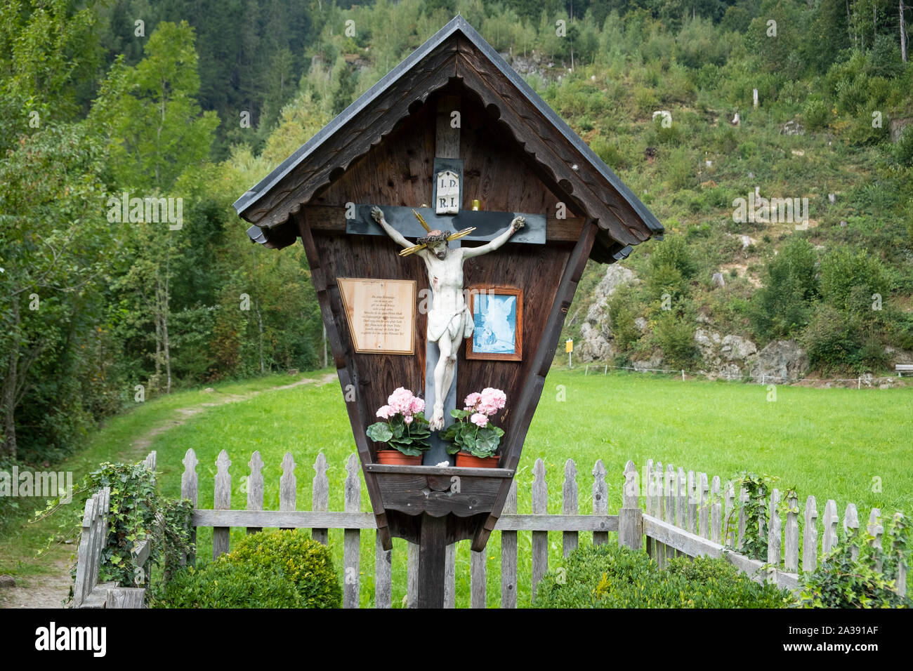 Wayside Cross between Zellberg and Hippach in Austria, Zillertal, Tyrol. Stock Photo
