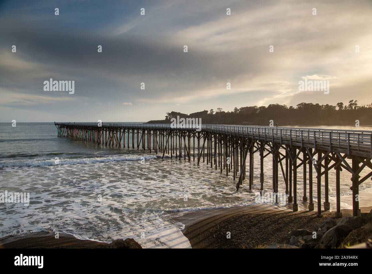 timber pier at sunset, California Stock Photo