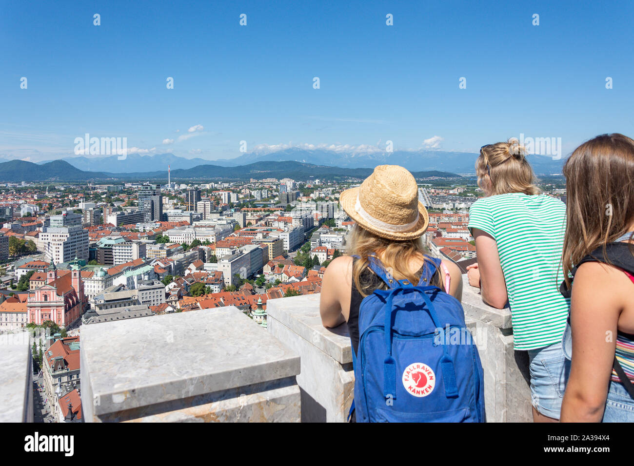 Young women viewing city from Ljubljana Castle, Old Town, Ljubljana, Slovenia Stock Photo