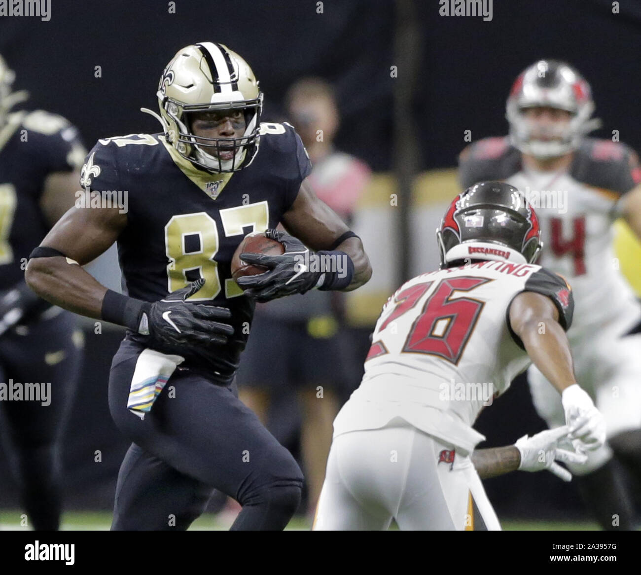 New Orleans, United States. 06th Oct, 2019. New Orleans Saints tight end Jared Cook (87) takes a Teddy Bridgewater pass up the field against Tampa Bay Buccaneers defensive back Sean Murphy-Bunting (26) at the Louisiana Superdome in New Orleans on Sunday, October 6, 2019. Photo by AJ Sisco/UPI Credit: UPI/Alamy Live News Stock Photo
