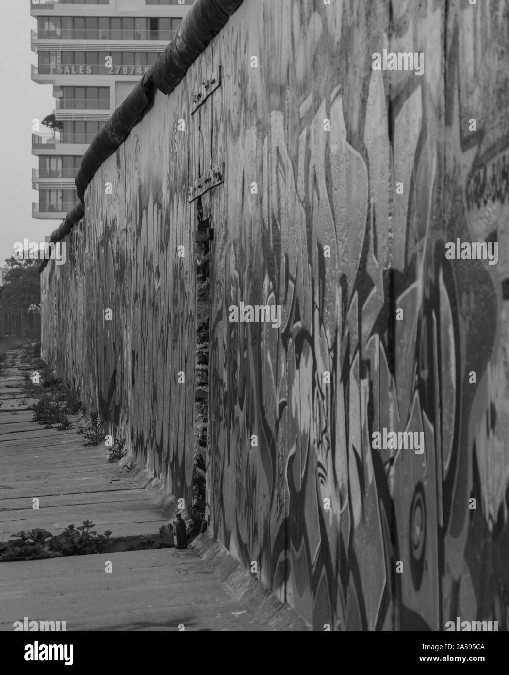A black and white picture of the East Side Gallery wall section, in