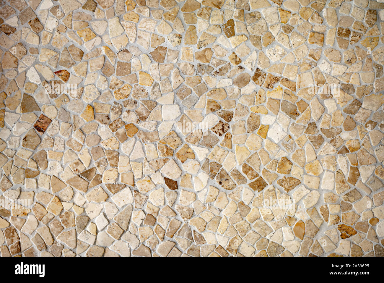 Wall of uneven stones as a background Stock Photo