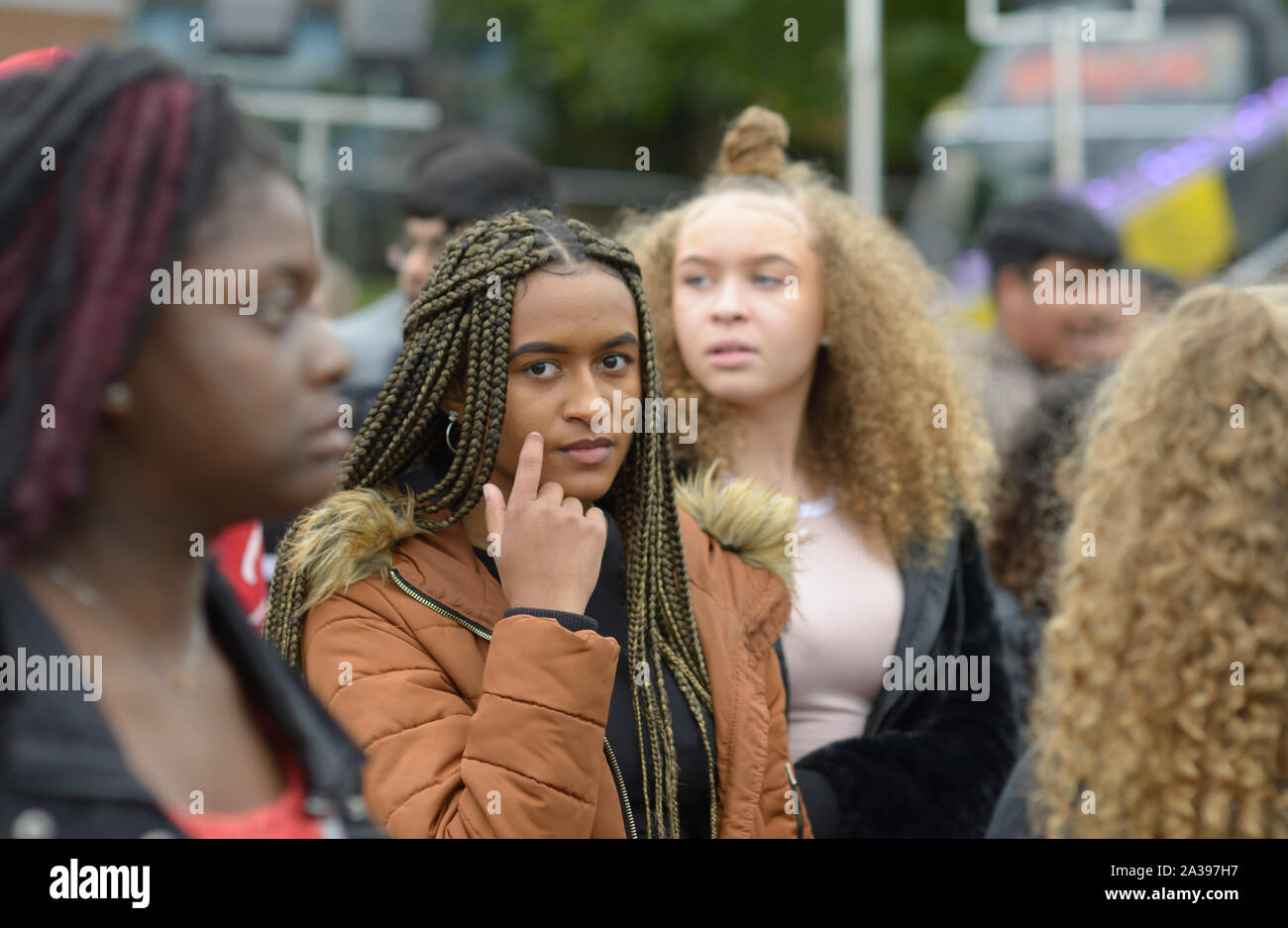 Mixed races group of girls, at Goose Fair, Nottingham Stock Photo