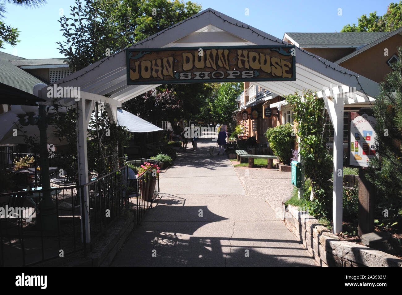 Entrance to the John Dunn shops near the historic plaza in Taos, New Mexico. The shops are named after Long John Dunn, local character and legend.. Stock Photo