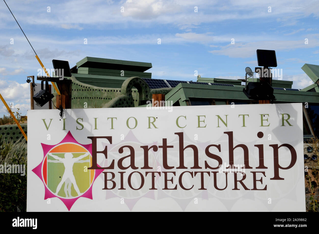 Sign directing visitors to the Earthship Biotecture complex on the outskirts of Taos New Mexico USA. Stock Photo