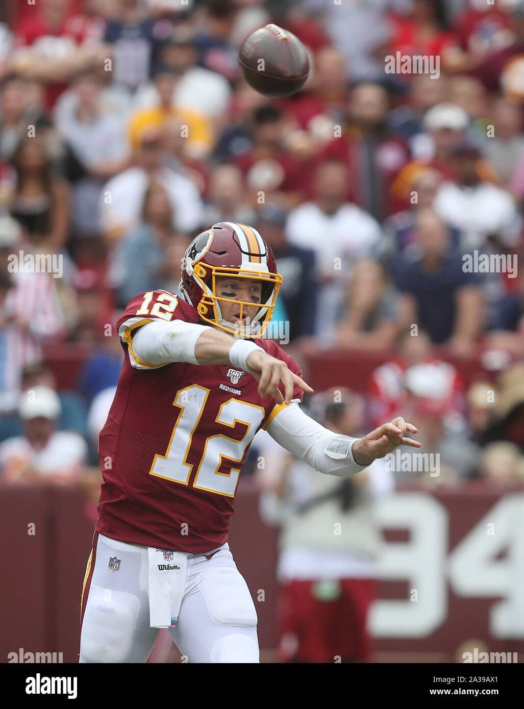 Washington Redskins quarterback Colt McCoy (12) tosses a pass during the  first day of NFL football training camp in Richmond, Va., Thursday, July  25, 2019. (AP Photo/Steve Helber Stock Photo - Alamy