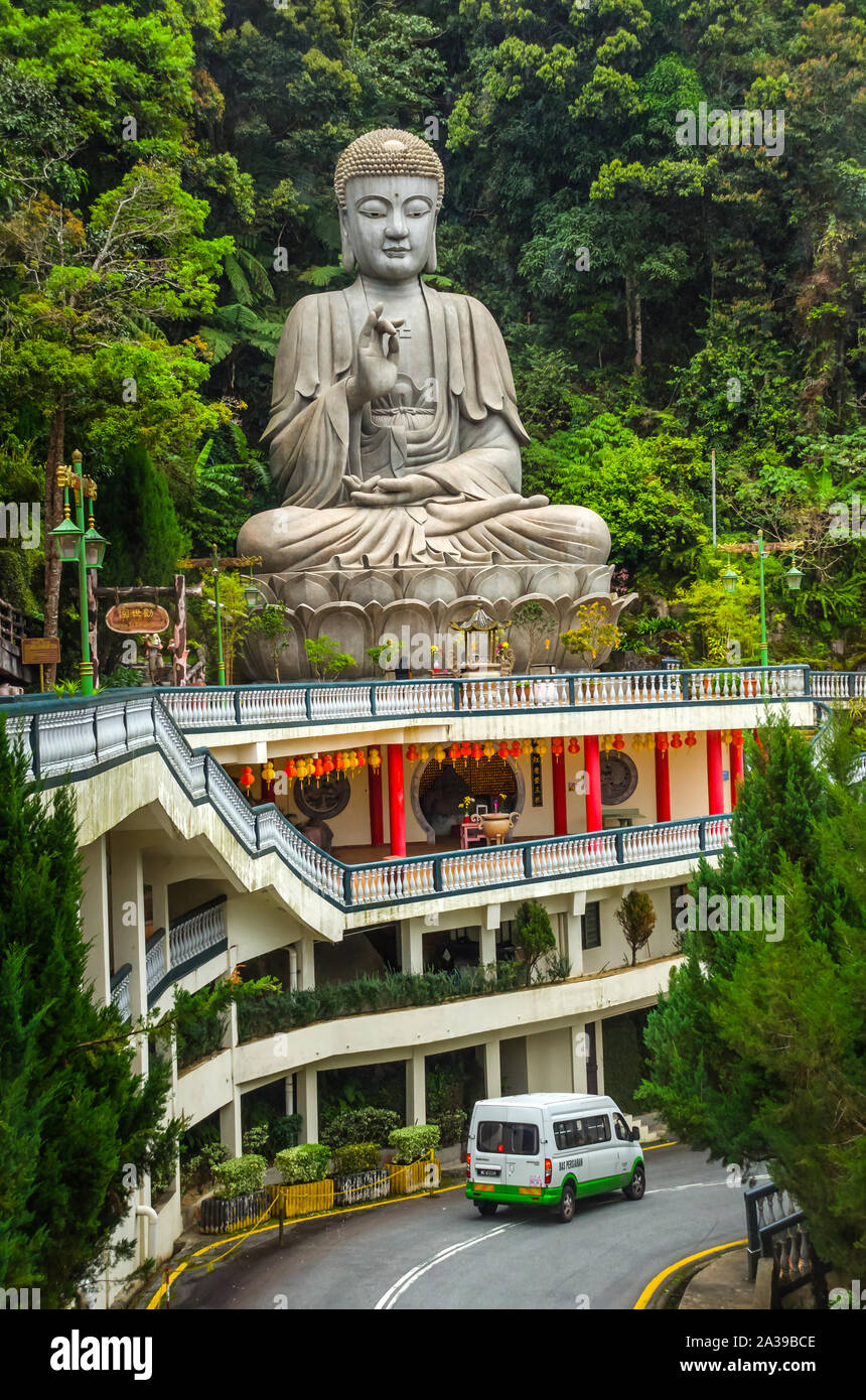 PAHANG MALAYSIA - DECEMBER 18, 2018: Beautiful giant meditating rock Buddha statue in Chin Swee caves Chinese temple, Genting highlands, Malaysia. Stock Photo