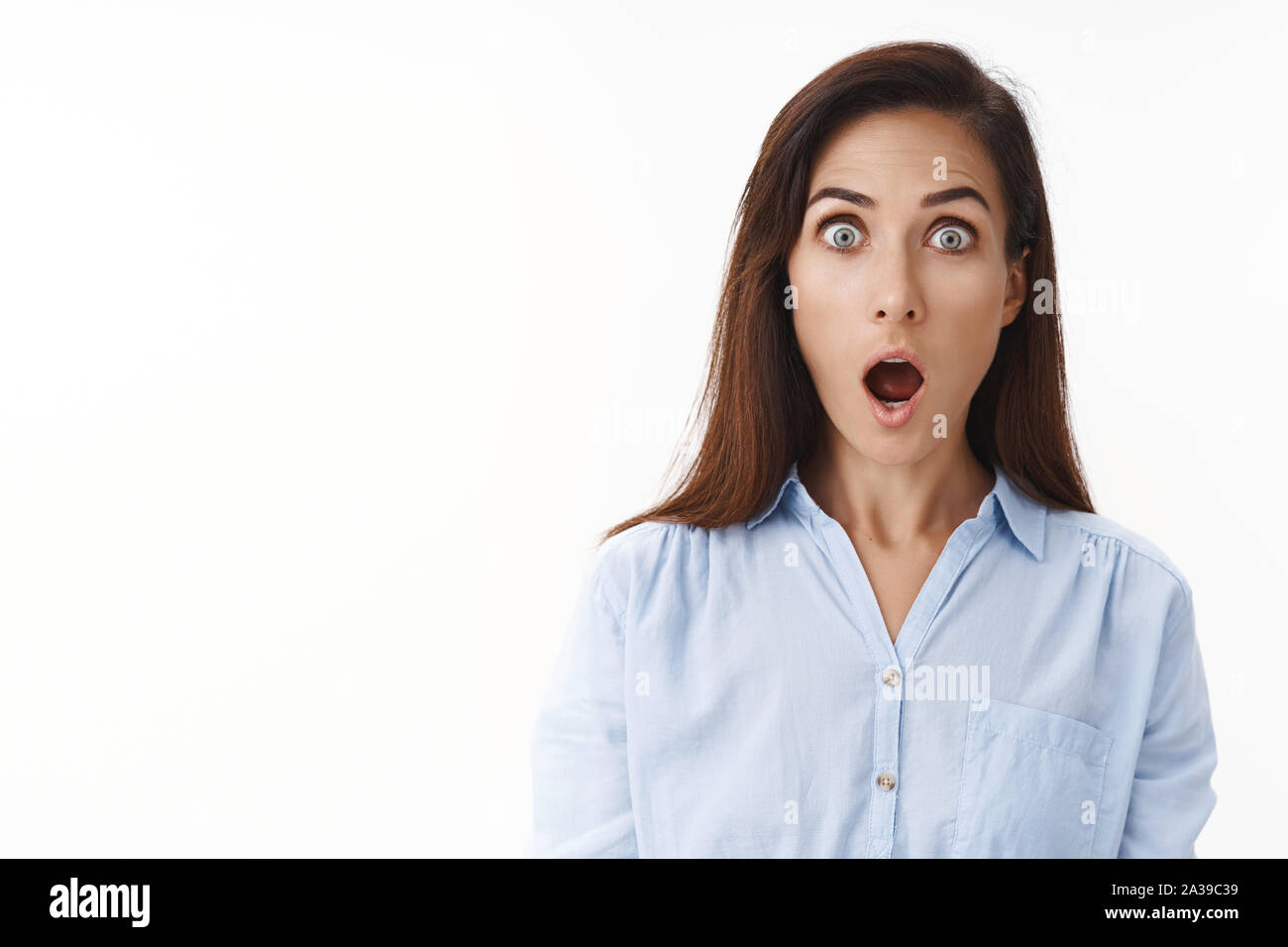 Amazed speechless adult mother react shocked situation, stare camera ambushed, open mouth, drop