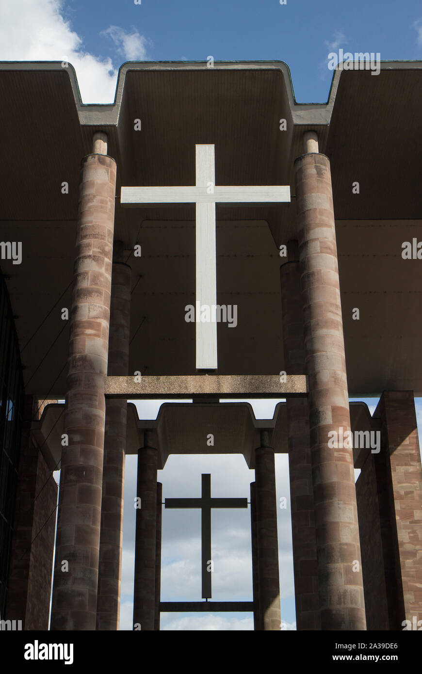 Crosses above entrance to Coventry Cathedral Stock Photo