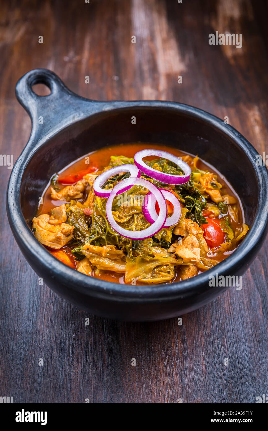 Delicious savoy cabbage stew or soup with chicken Stock Photo Alamy