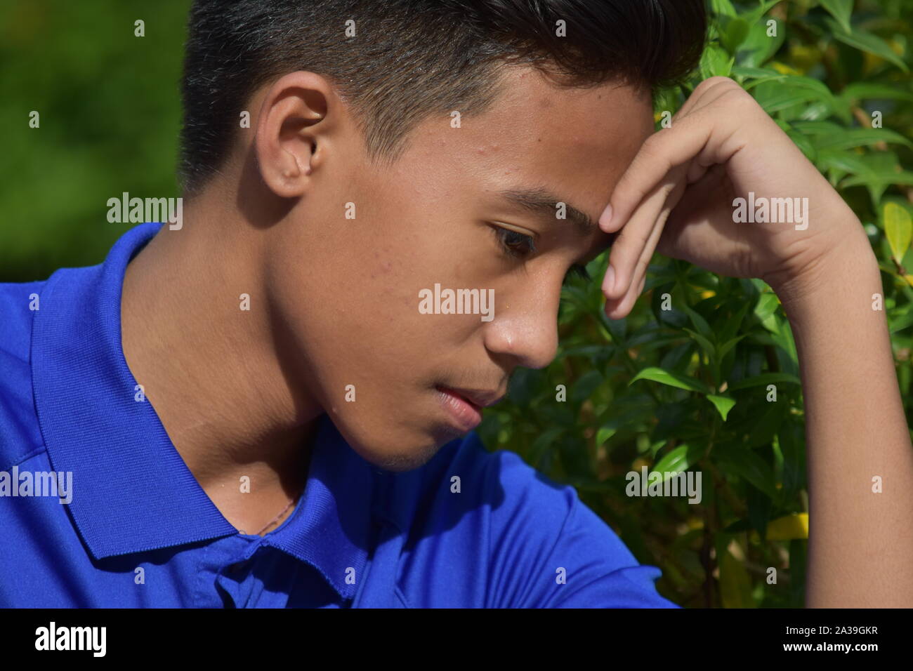 An Asian Teenager Boy And Loneliness Stock Photo