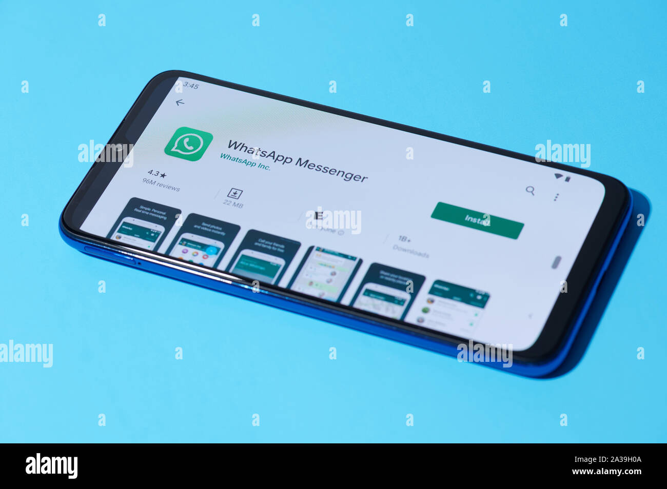 New york, USA - september 28, 2019:Installing mobile whatsapp app on smartphone screen close up view Stock Photo