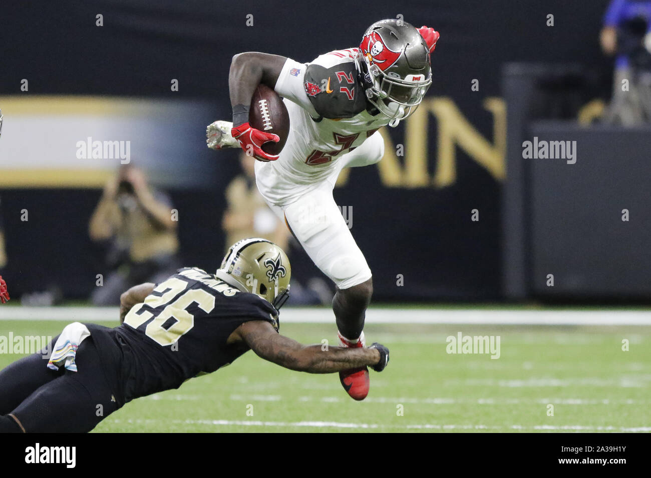 New Orleans, LOUISIANA, USA. 6th Oct, 2019. (left to right) New Orleans Saints cornerback P.J. Williams tackles Tampa Bay Buccaneers running back Ronald Jones in New Orleans, Louisiana USA on October 6, 2019. The Saints beat the Buccaneers 31-24. Credit: Dan Anderson/ZUMA Wire/Alamy Live News Stock Photo