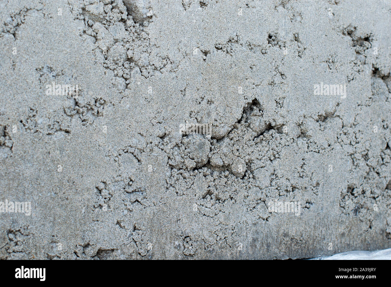 Concrete block for wall construction. Pronounced texture. Close-up. Russia. Stock Photo