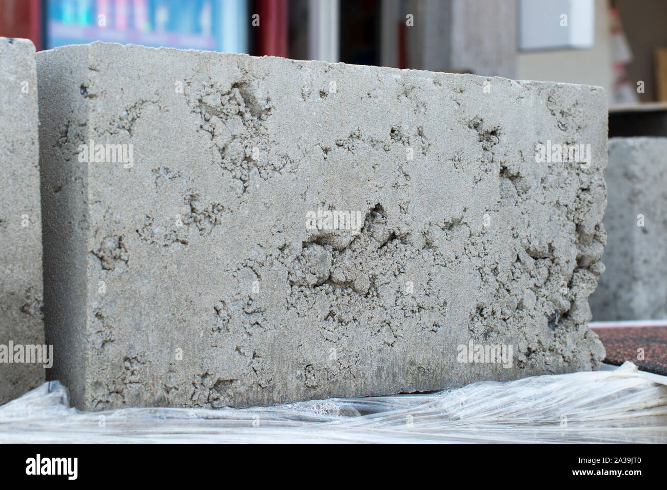 Concrete block for wall construction. Pronounced texture. Close-up. Russia. Stock Photo