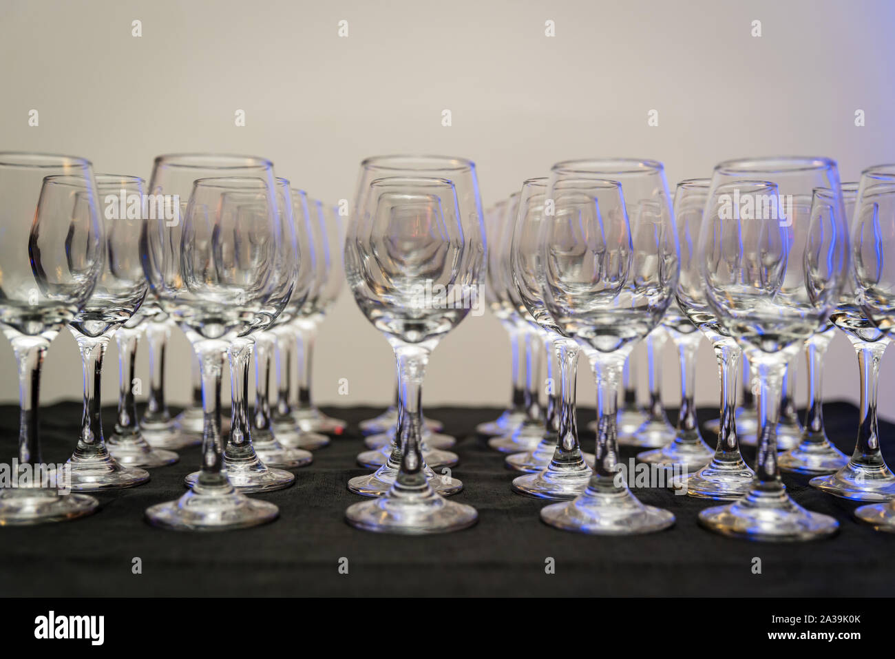 Rows of wine glasses Stock Photo