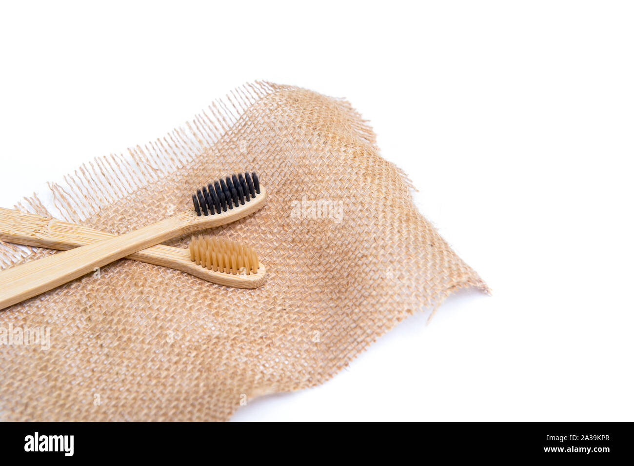 Bamboo tooth brush on white background Stock Photo